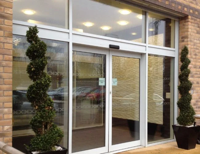 Automatic aluminium shopfront door installation in the UK by Speedy Shopfronts