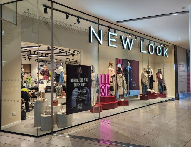 Frameless Glass Shopfronts UK installation for commercial shops