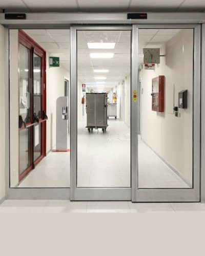 Automatic telescopic door shopfronts UK with multi-panel sliding glass system